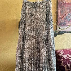 Vince Camuto skirt size 10 Animal Print, pleated,32” waist, 52+” hip.
